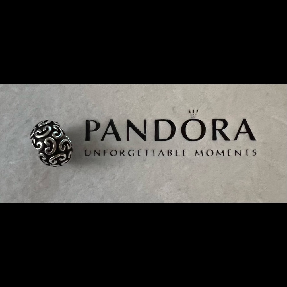 Pandora “groovy” charm